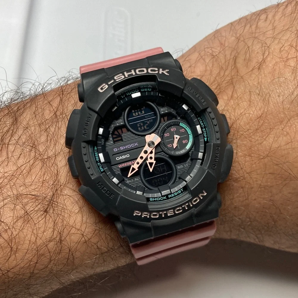 Casio Gshock, GMA-S140, gray bezel, dusty pink strap and accents working battery